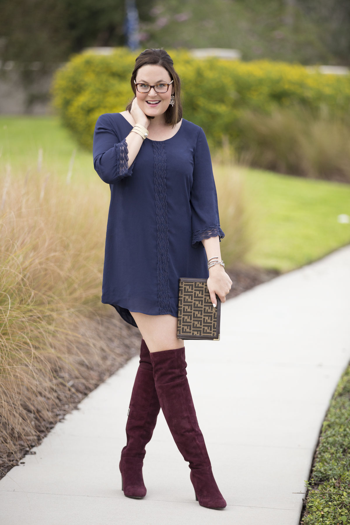 Florida lifestyle blogger, MikaelaJ, shares the perfect outfit to kick of Fall! Knee high boots and a lace trimmed dress both in gorgeous jewel tones!
