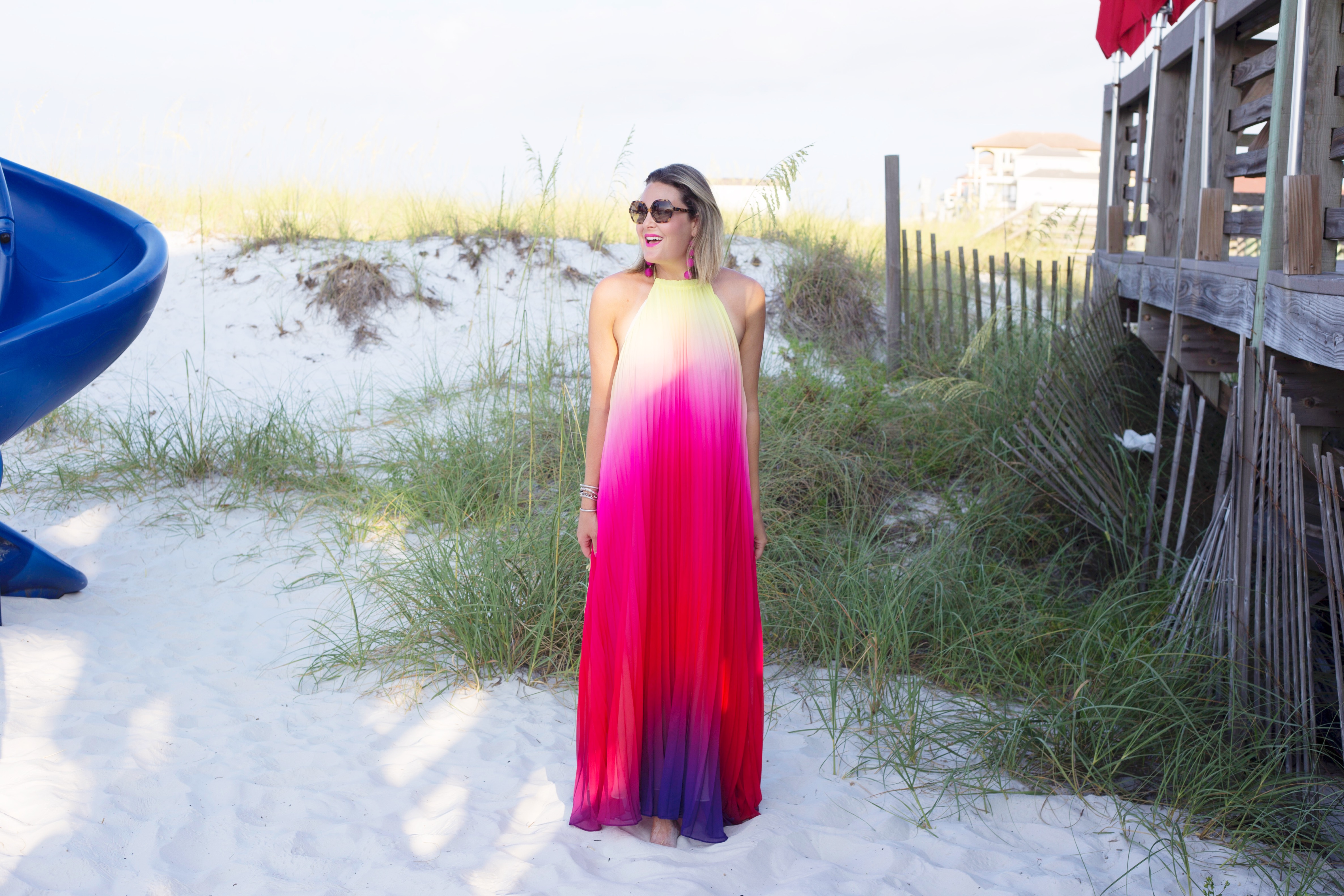 Florida lifestyle blogger, MikaelaJ, shares a gorgeous rainbow maxi dress in this new edition of What I'm Wearing Wednesday!