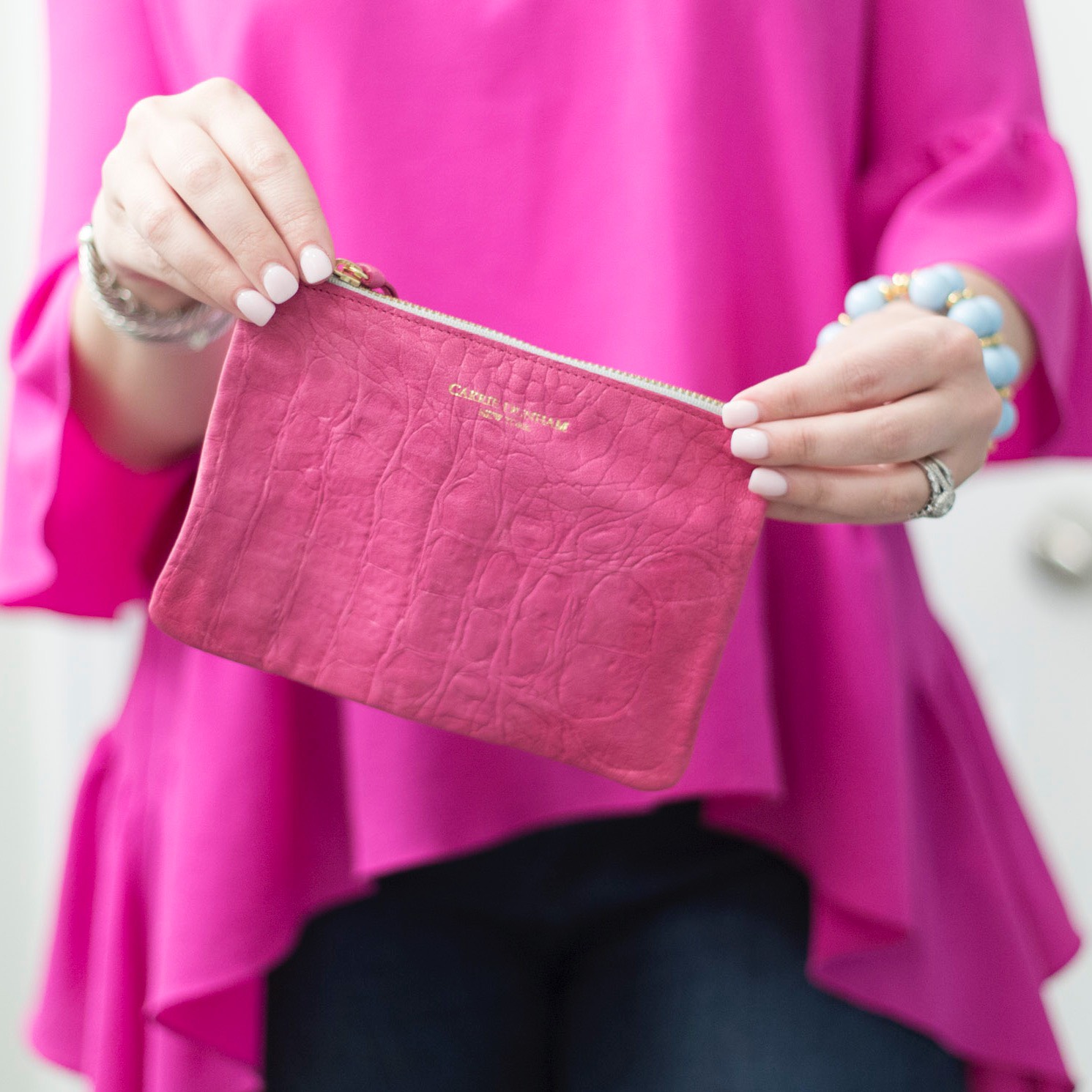 Florida lifestyle blogger, MikaelaJ, shares what she's currently loving + the cutest zip pouch from Carrie Dunham. Check it out!